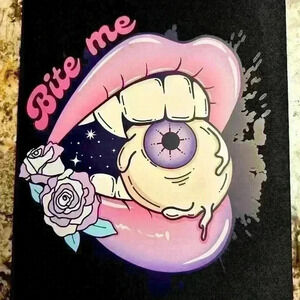 Bite me ! mouse pad, made by me.  Standard size